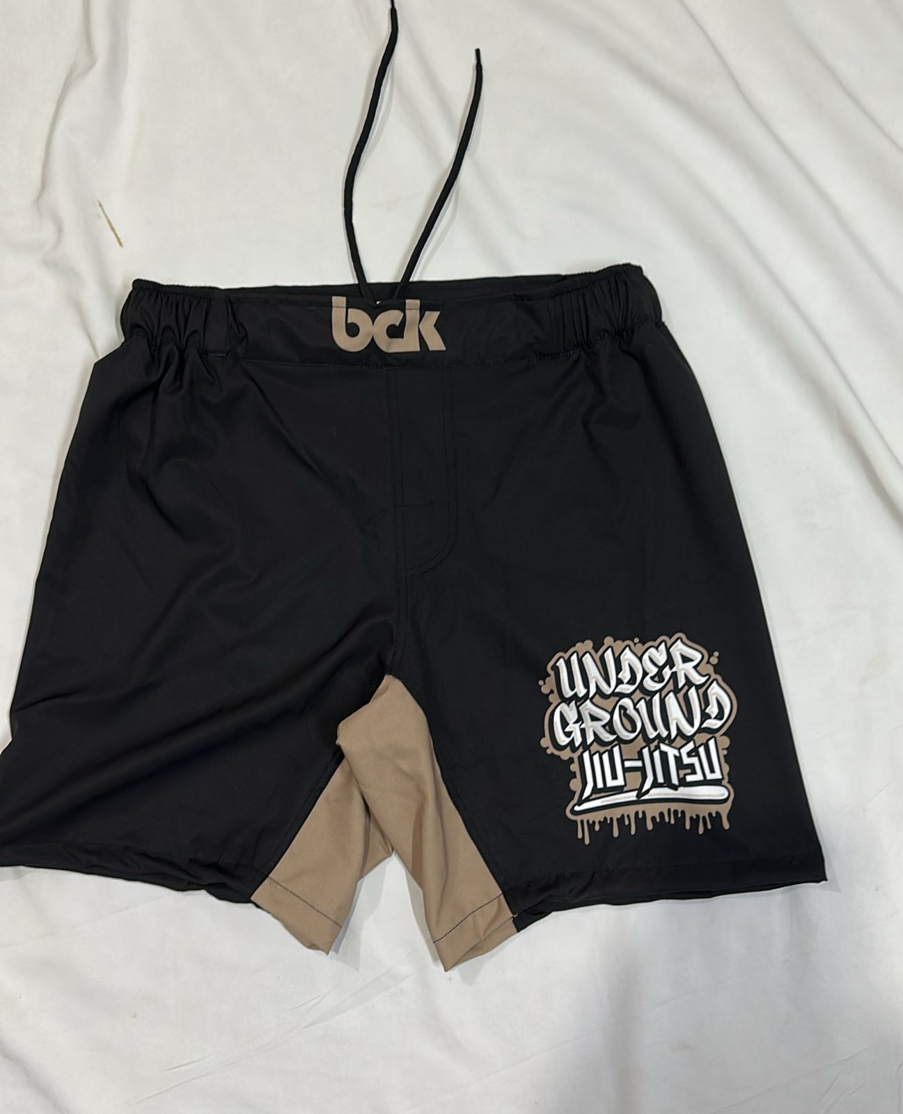 Black and gold Underground grappling shorts